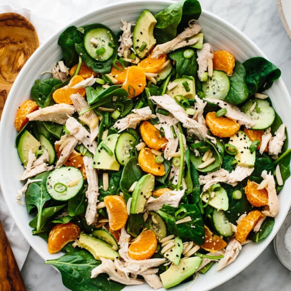 A large white bowl of mandarin chicken salad.