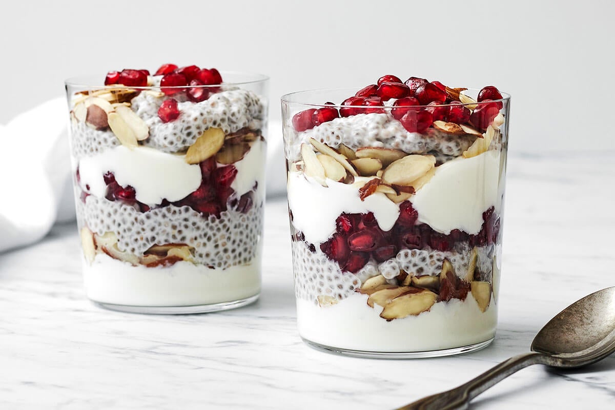Glasses of pomegranate chia pudding parfait