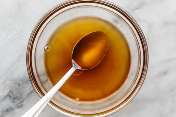 A bowl of stone fruit salad dressing