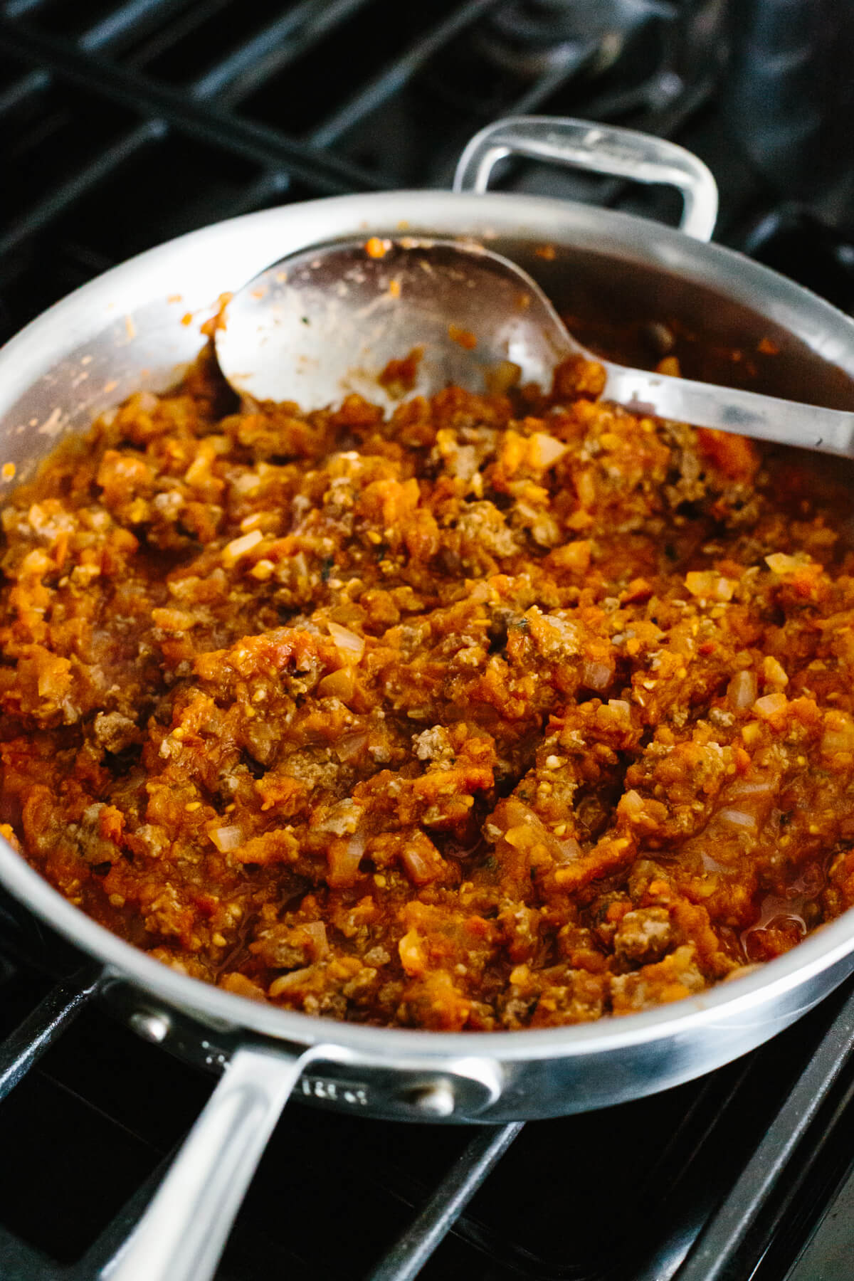 Bolognese sauce in a pan on the stove.