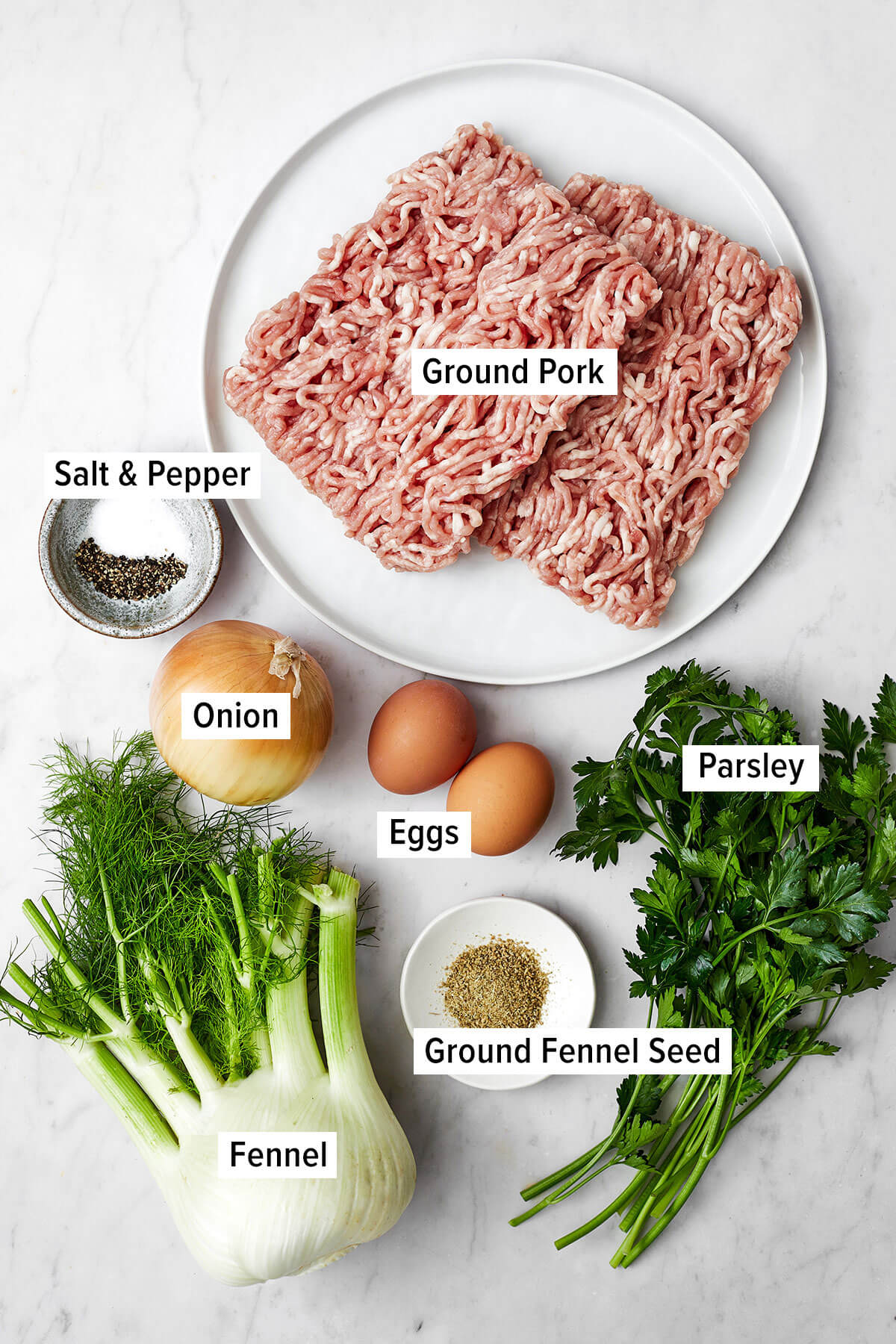 Ingredients for fennel pork meatballs on a table