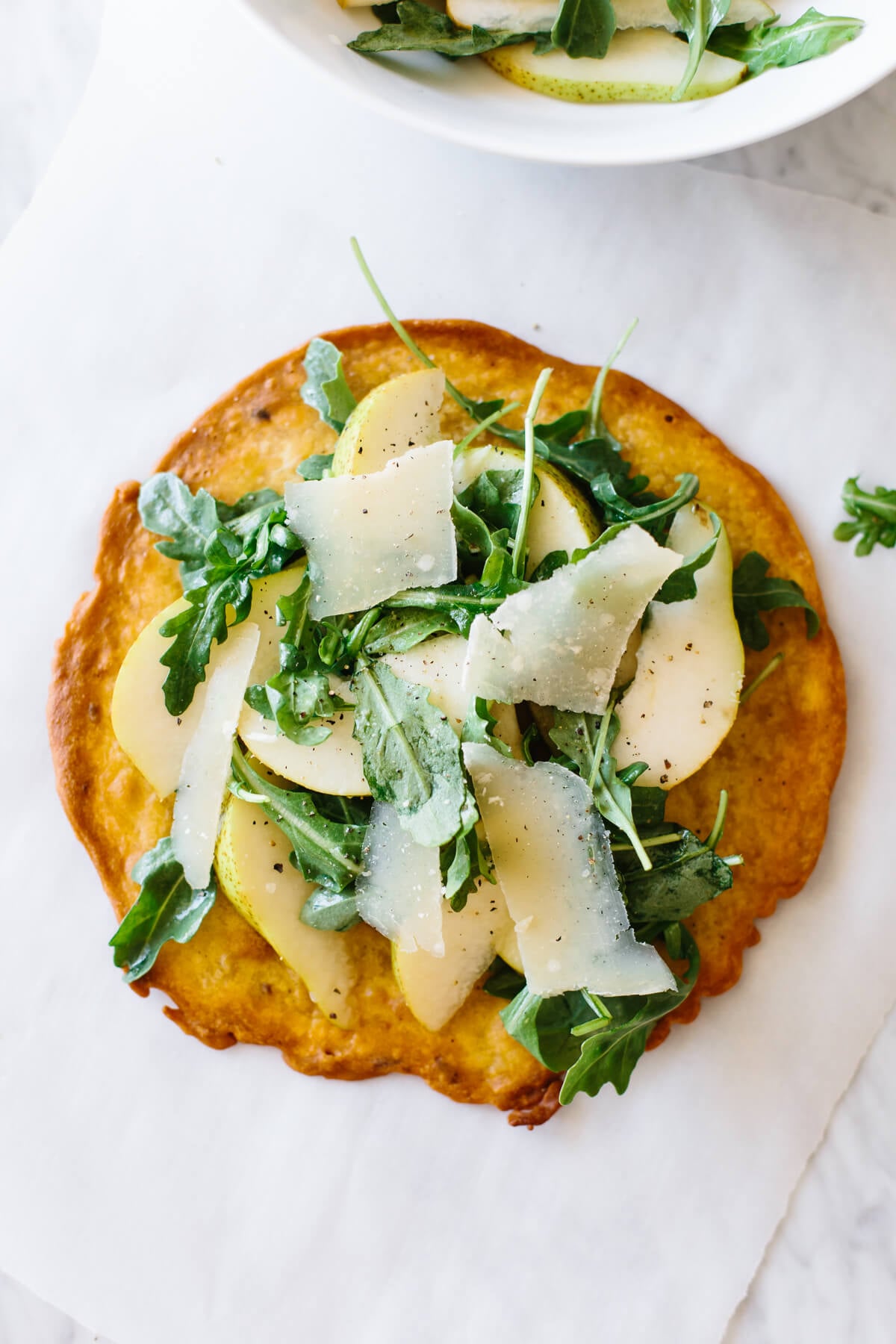 Socca is a nutty, herby chickpea flatbread that's naturally gluten-free! Socca recipe with toppings.