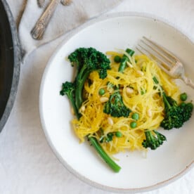 Spaghetti squash with broccolini and truffle oil. This naturally gluten-free "spaghetti" is a healthy and delicious pasta alternative.
