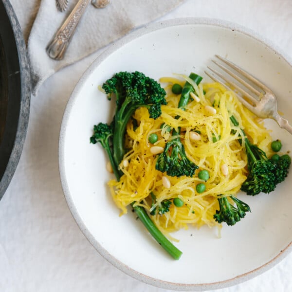 Spaghetti squash with broccolini and truffle oil. This naturally gluten-free "spaghetti" is a healthy and delicious pasta alternative.
