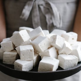 These healthy, paleo-friendly homemade marshmallows use honey or maple syrup instead of corn syrup and high-quality gelatin.