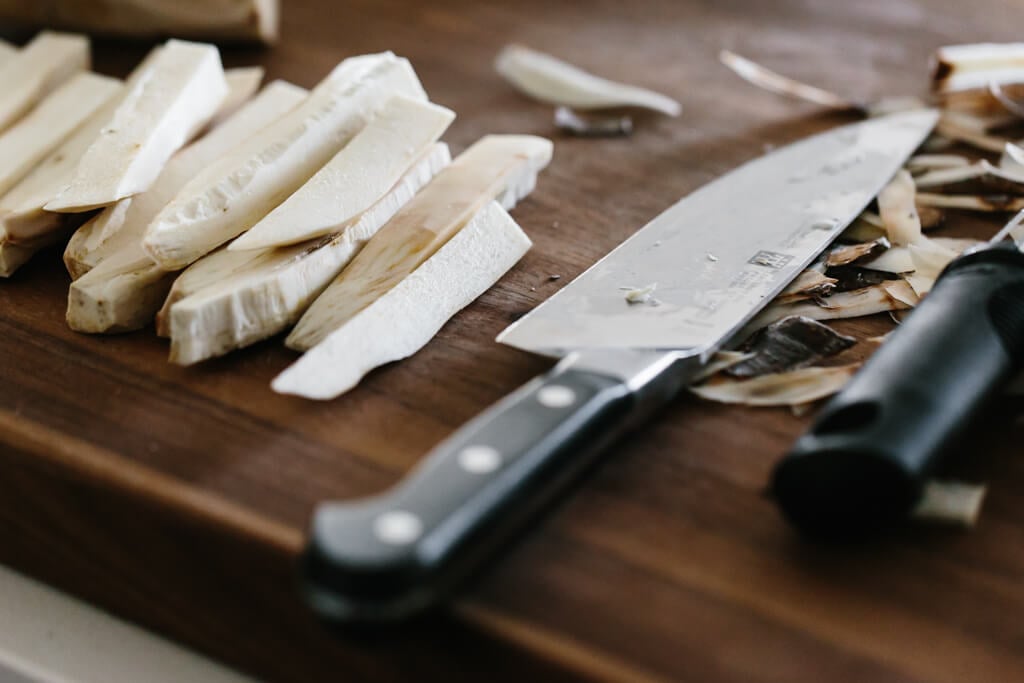 Baked yuca fries (also known as cassava fries) are golden and crispy on the outside and soft on the inside. They're a healthier way to make yuca fries and I'm serving them up with cilantro lime mayonnaise.