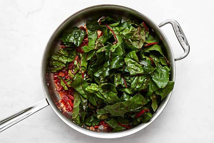 A pan of cooked Swiss chard.