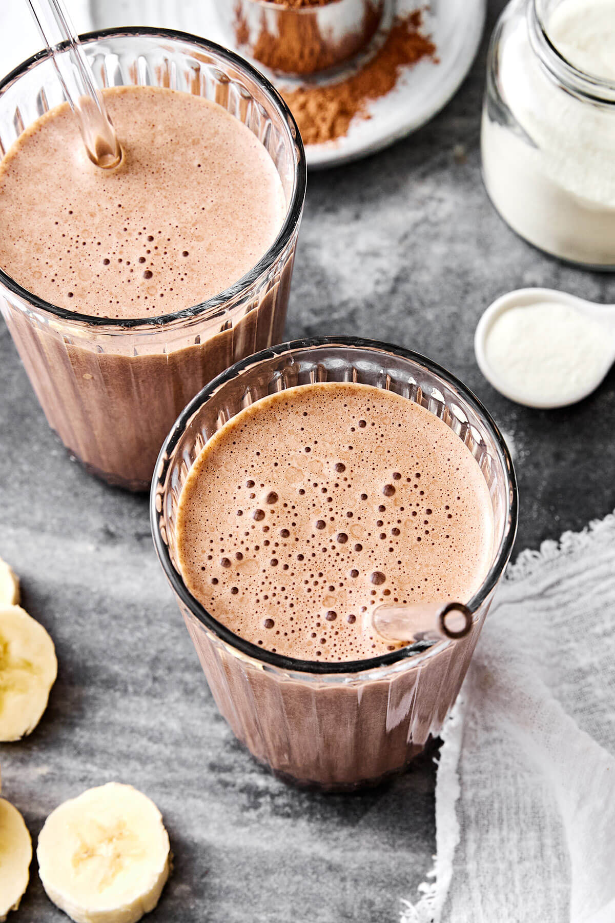 Glow from within with this creamy chocolate collagen smoothie! Made with just 5 simple ingredients, it’s quick, nourishing, and delicious. Chocolate collagen smoothie recipe.