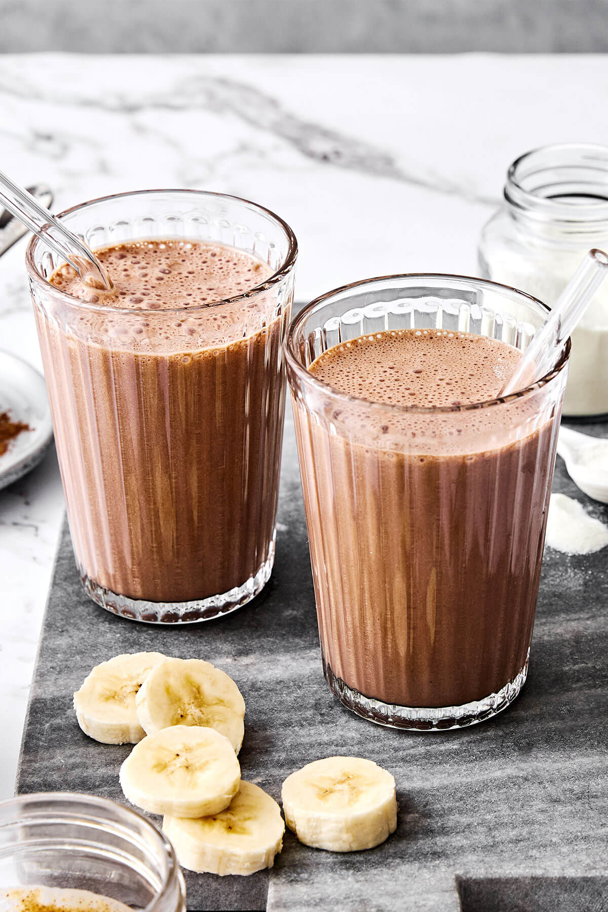 Glow from within with this creamy chocolate collagen smoothie! Made with just 5 simple ingredients, it’s quick, nourishing, and delicious. Chocolate collagen smoothie.