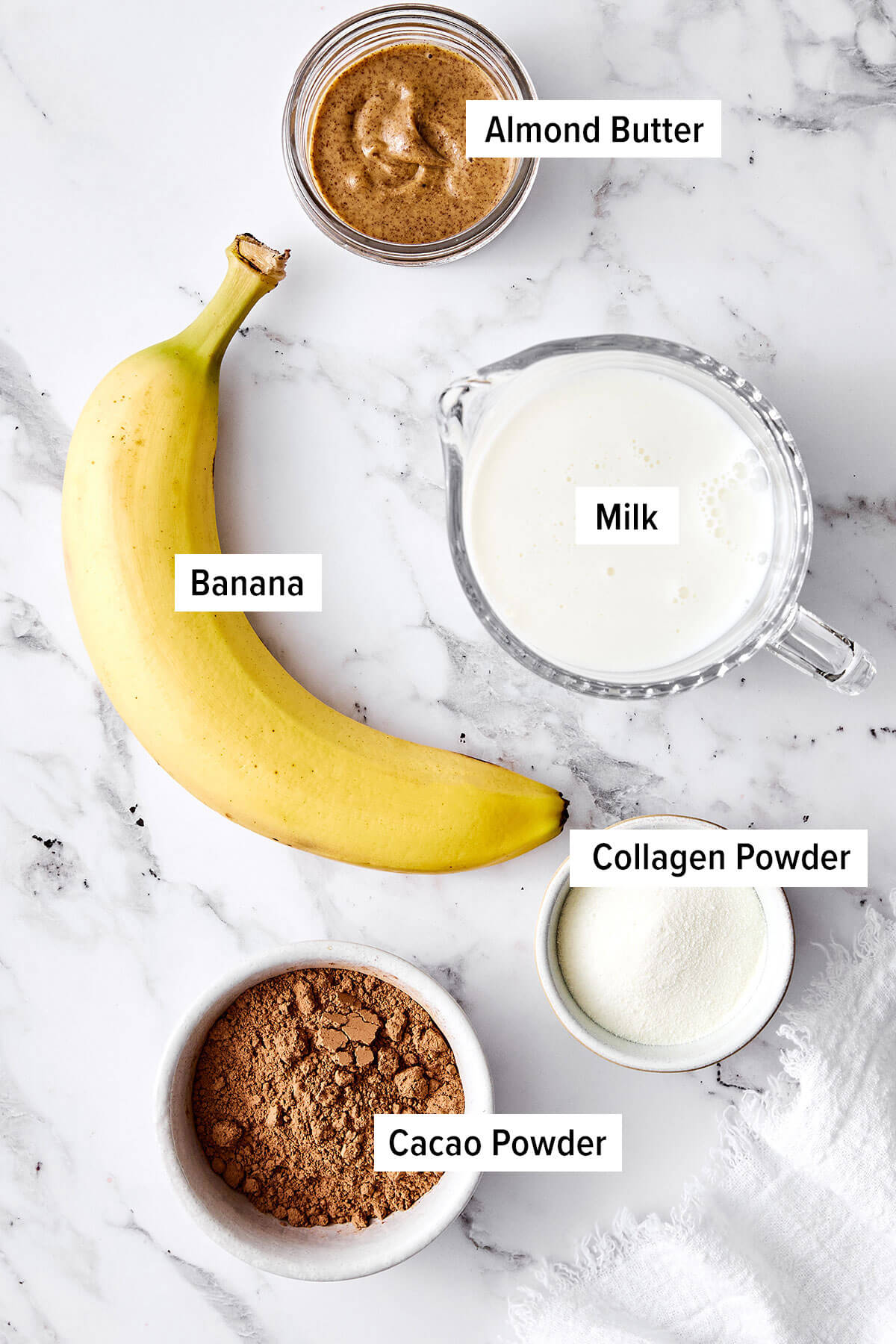 Glow from within with this creamy chocolate collagen smoothie! Made with just 5 simple ingredients, it’s quick, nourishing, and delicious. Ingredients for a chocolate collagen smoothie.