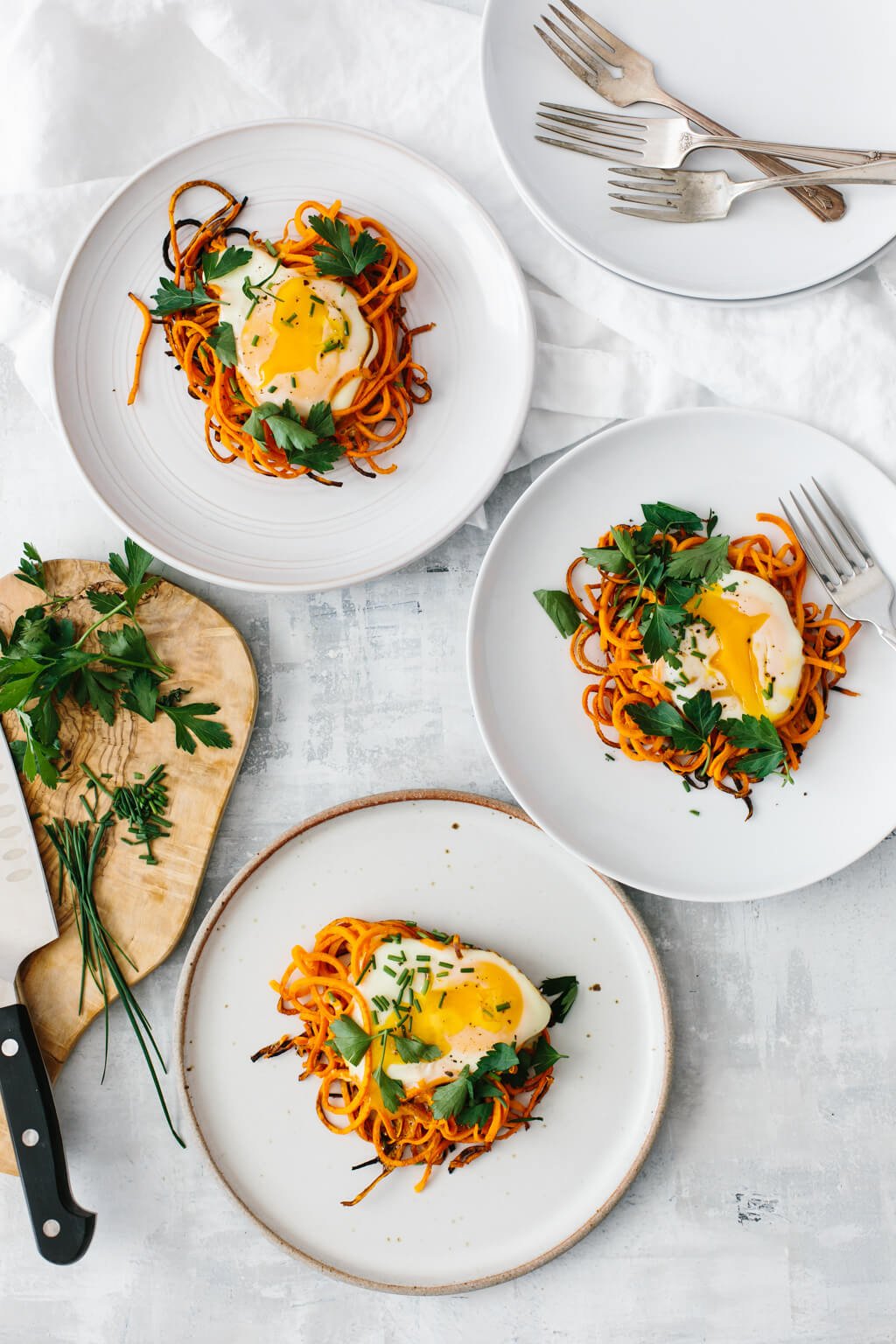 Spiralized sweet potato egg nests are a simple, delicious and healthy breakfast recipe. It's one of my favorite spiralized sweet potato recipes and it's perfect for a weekend breakfast or brunch.