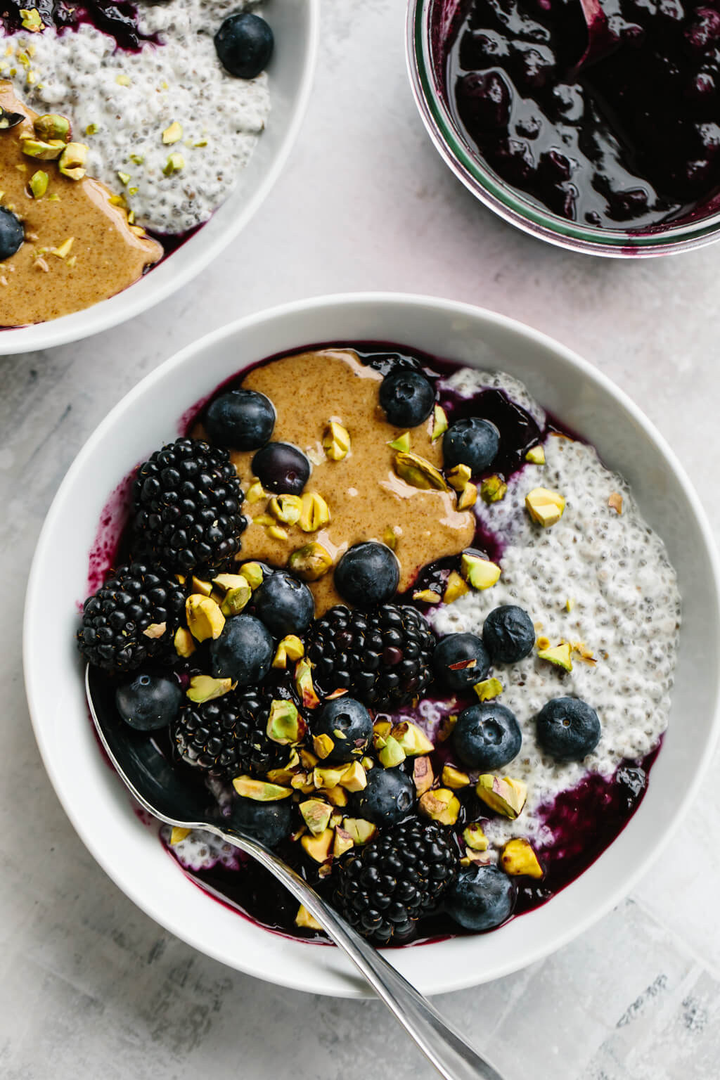 This peanut butter and jelly chia pudding (or almond butter and blueberry puree chia pudding) tastes just like a PB&J sandwich. It's a delicious, healthy breakfast recipe!
