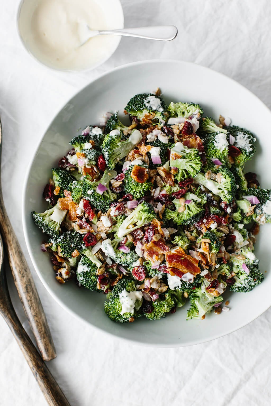 This delicious broccoli salad is a combination of broccoli, bacon, red onion, cranberries, sunflower seeds and goat cheese. It's an easy, healthy broccoli salad recipe. 