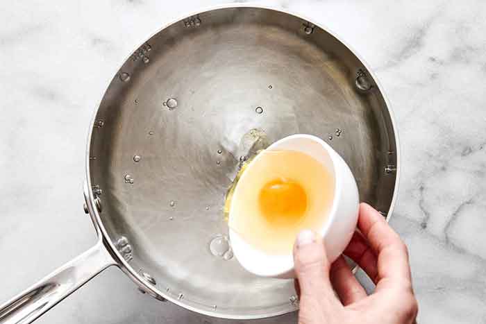 Step three of poached eggs: Create a vortex.