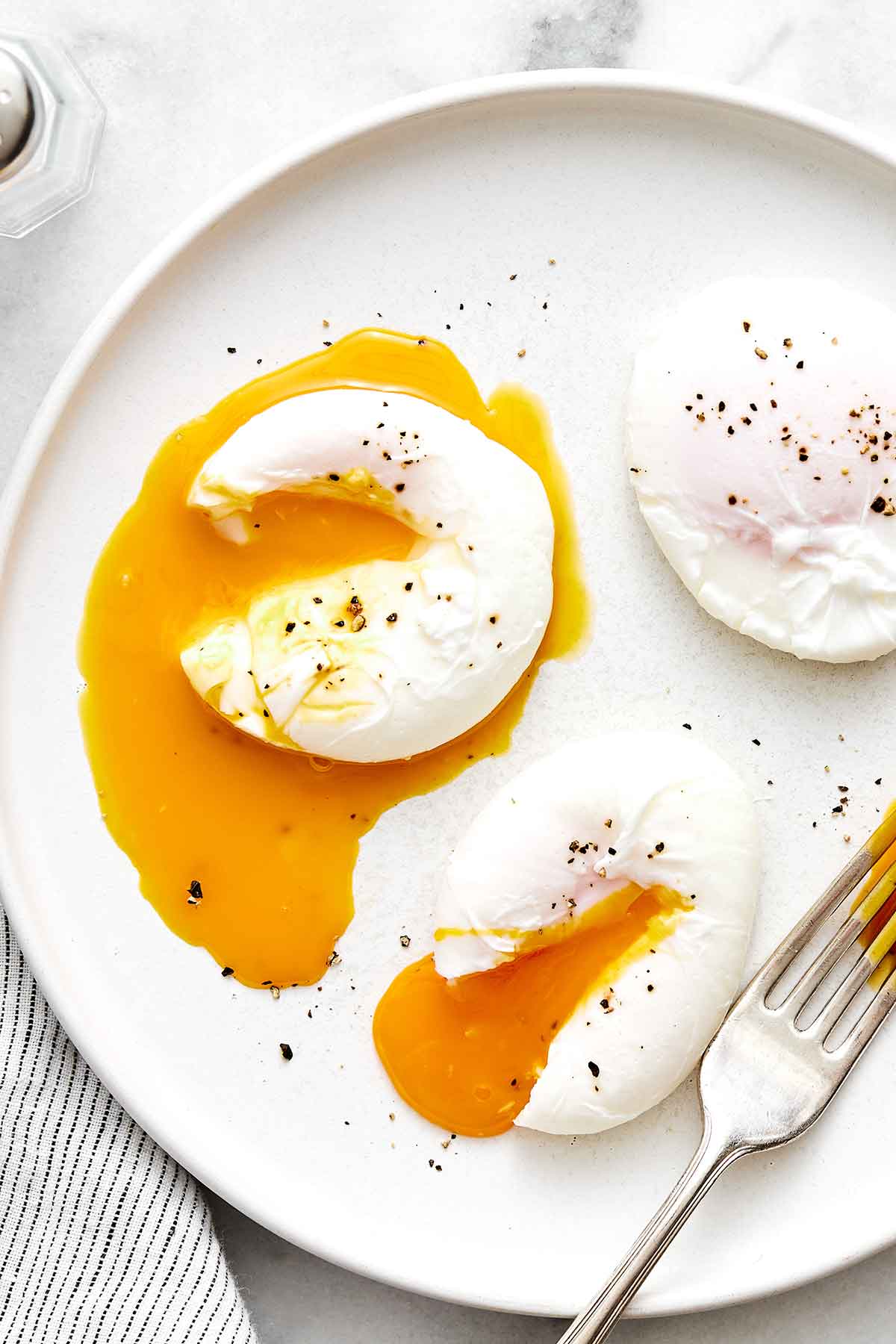 Poached eggs on a plate.