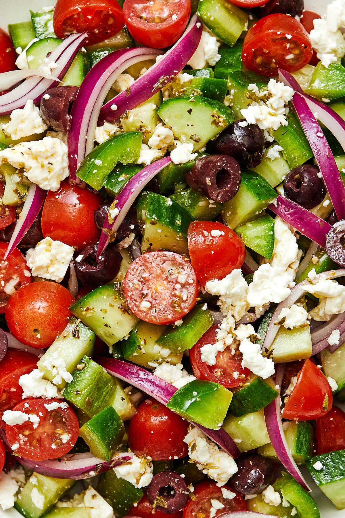 Greek salad is easy to make and bursting with flavor. With only six ingredients, it's one of the best healthy salad recipes! A close up of a Greek salad