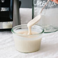 Homemade coconut butter is extremely easy to make - it only takes one ingredient and one minute in your blender! It's an easy coconut butter recipe.