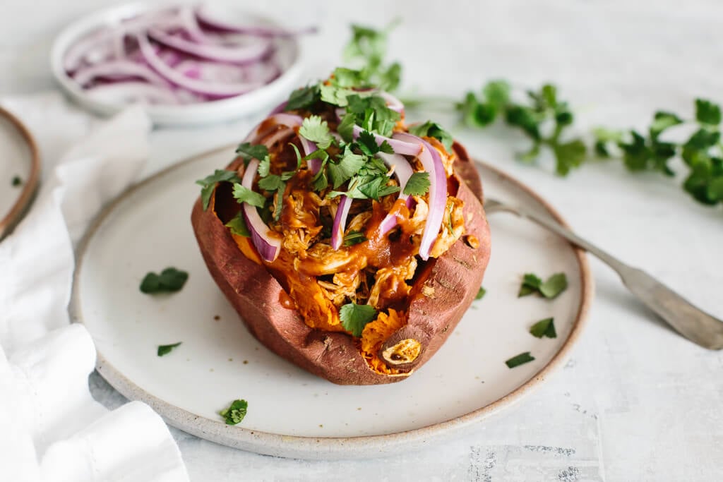 BBQ chicken stuffed sweet potatoes are a healthy, easy, gluten-free, paleo and Whole30 meal.