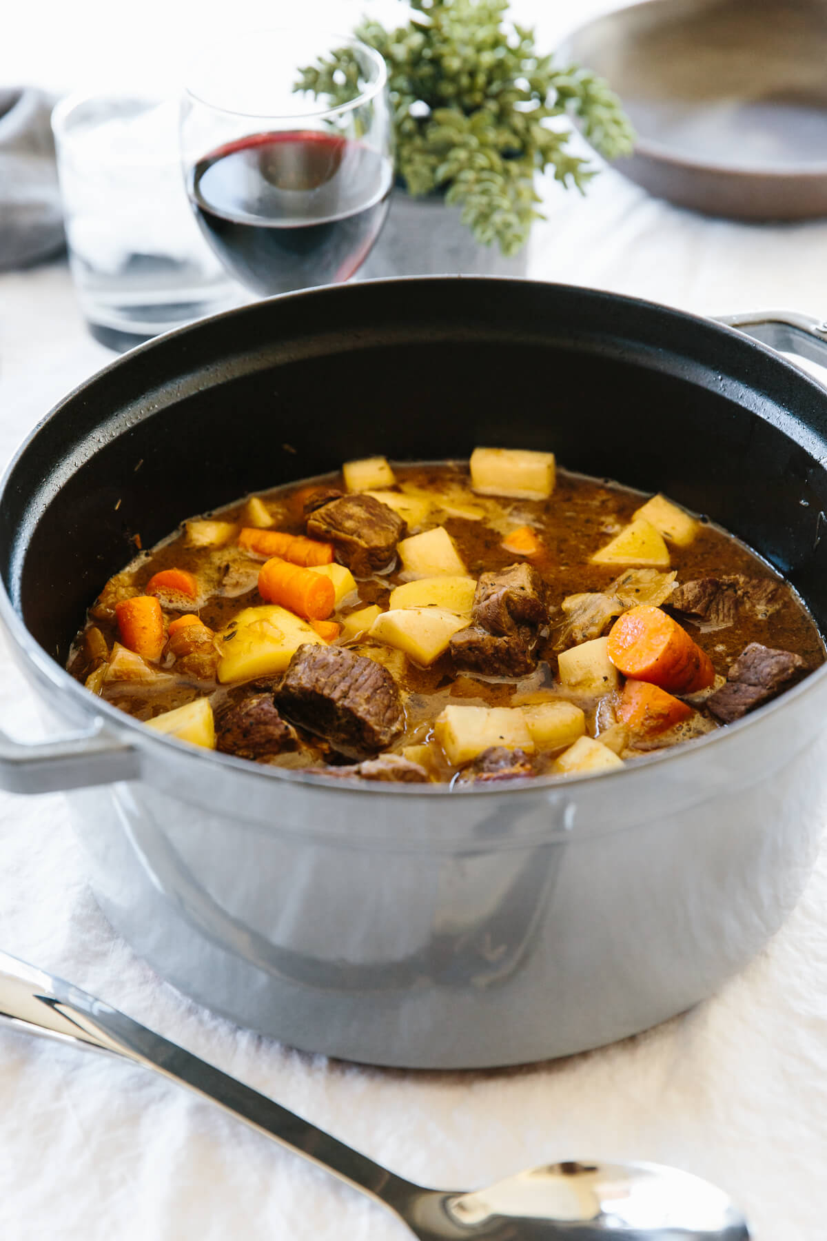 Lamb stew is a warm and flavorful stew recipe of tender lamb, potatoes, turnip, and onions! Lamb stew in a large pot.