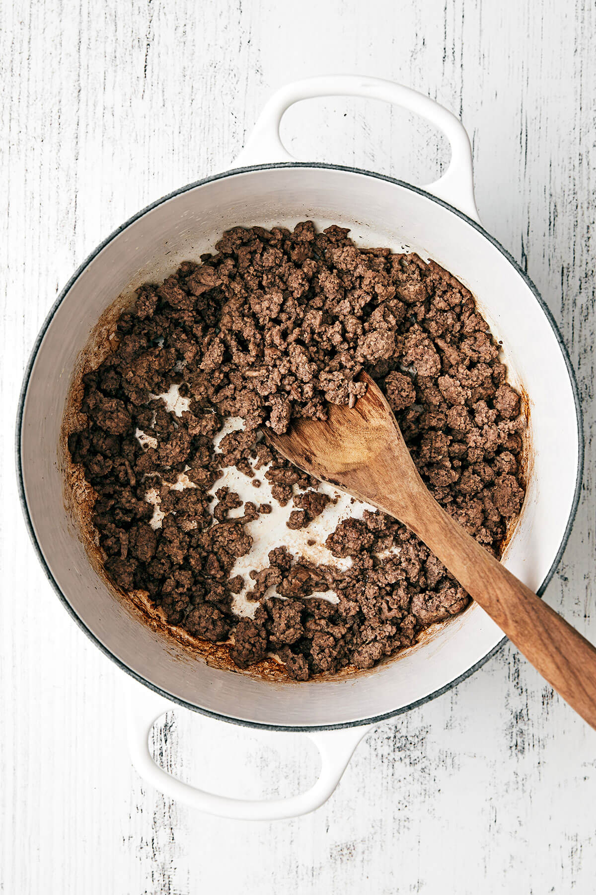 This taco soup is guaranteed to be a family favorite — with ground beef, a variety of beans and vegetables, and flavored with taco seasoning. Cooking ground beef in a pot