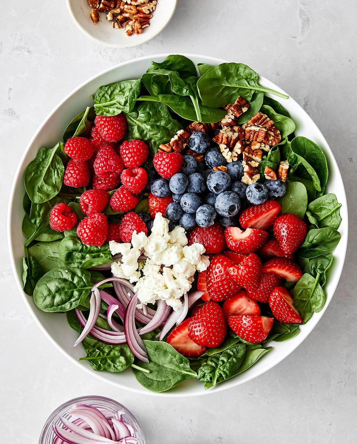 How to make a berry spinach salad.