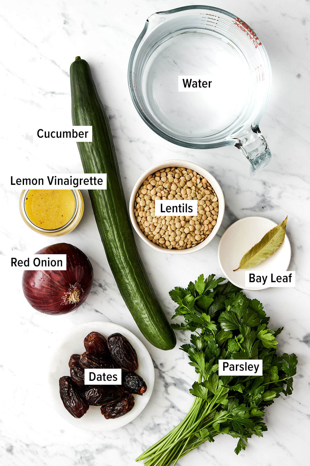 This lentil salad is crisp, fresh, and light with diced cucumber, red onion, dates, fresh herbs, and a bright lemon vinaigrette. Ingredients for lentil salad.