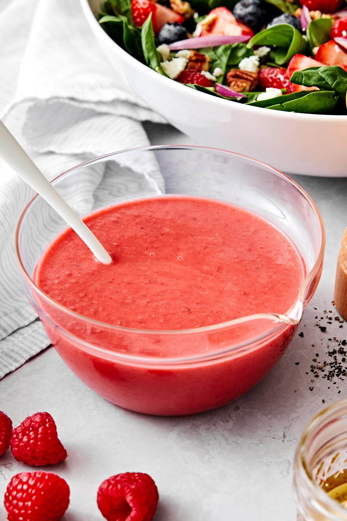 A bowl of fresh raspberry vinaigrette.