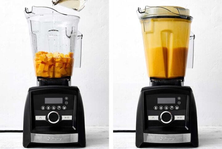 Blending mango margarita in a Vitamix.