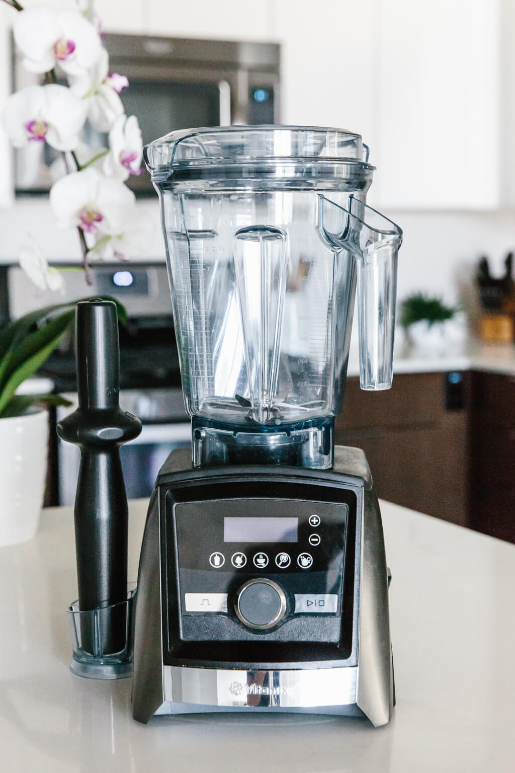 Vitamix blender sitting on a countertop.