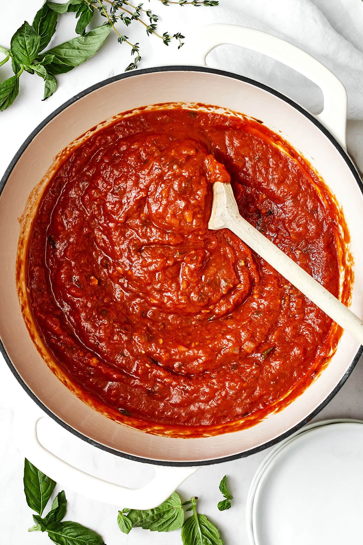 Nothing outshines a fresh batch of this homemade marinara sauce. Bonus — it’s super easy to make with just 5 simple ingredients! A big pot of homemade marinara sauce