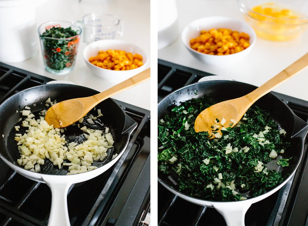 Sauteing onions, garlic and kale in a pan.