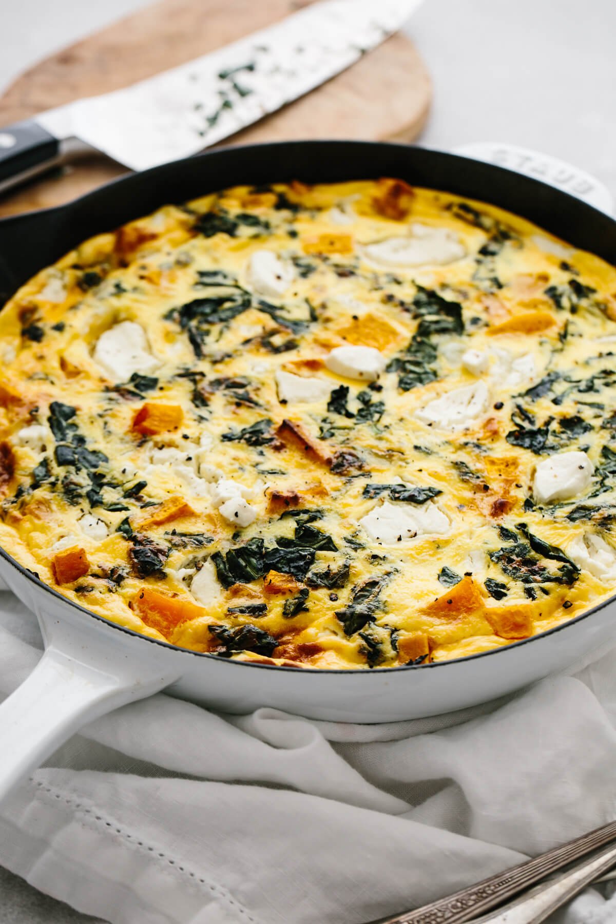 Butternut squash frittata served on a table.