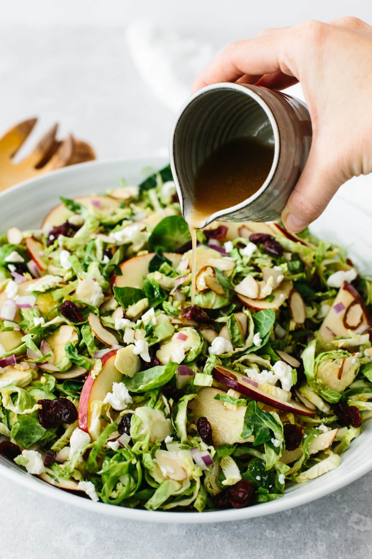 A bowl of a shaved Brussels sprouts salad