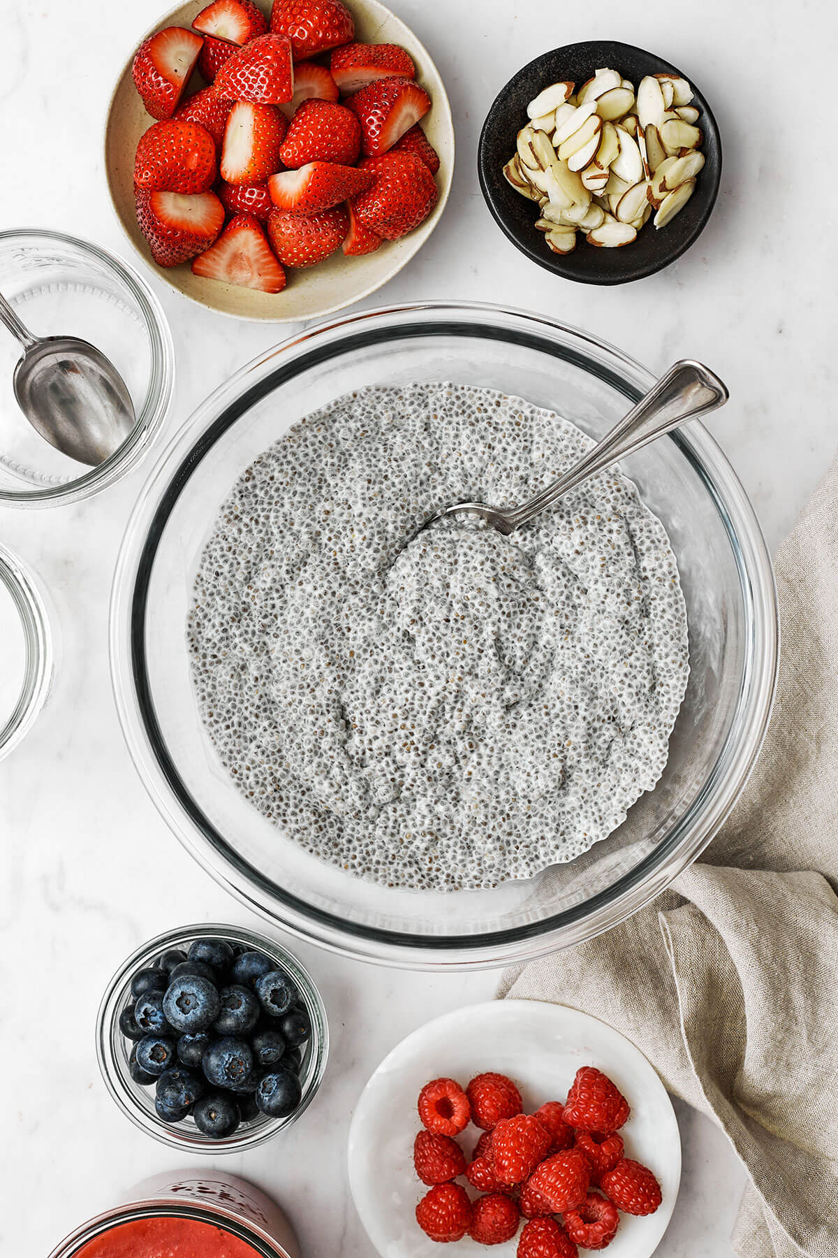 Make chia pudding for the week and you’ve got a healthy breakfast or snack right at your fingertips. Bonus — it's super easy to make! Assembling chia pudding with bowls of ingredients