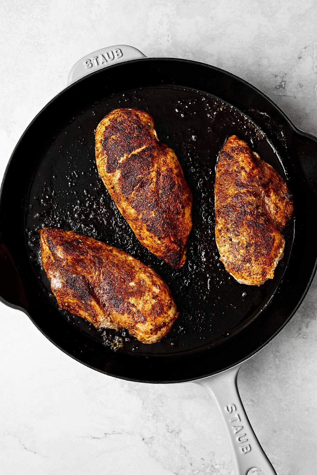 Enjoy these easy chicken fajitas with chicken and vibrant veggies tossed in the best fajita seasoning. Wrap them in tortillas for taco night! Seared chicken breasts.