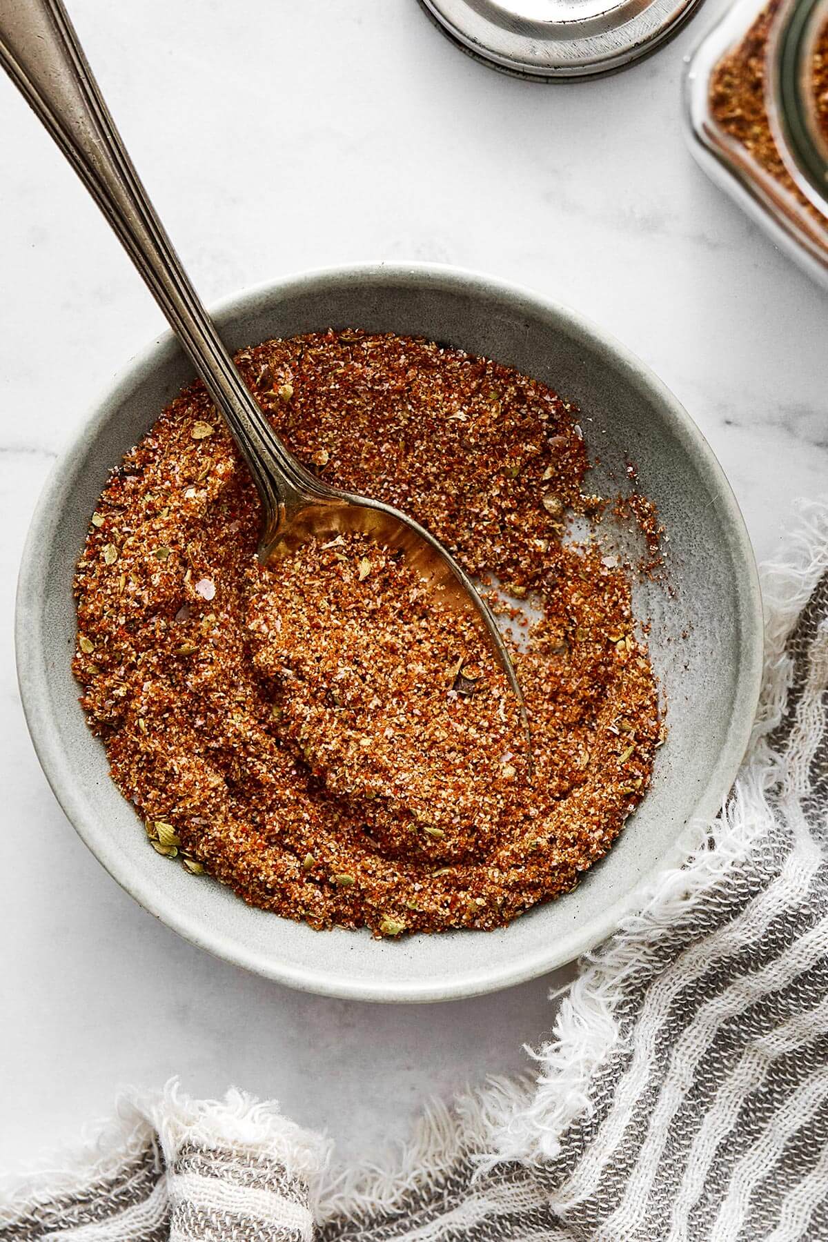 This fajita seasoning beats store-bought packets all day—from flavor to quality, and more! It'll be perfect for all sorts of fajita recipes. A bowl of homemade fajita seasoning.