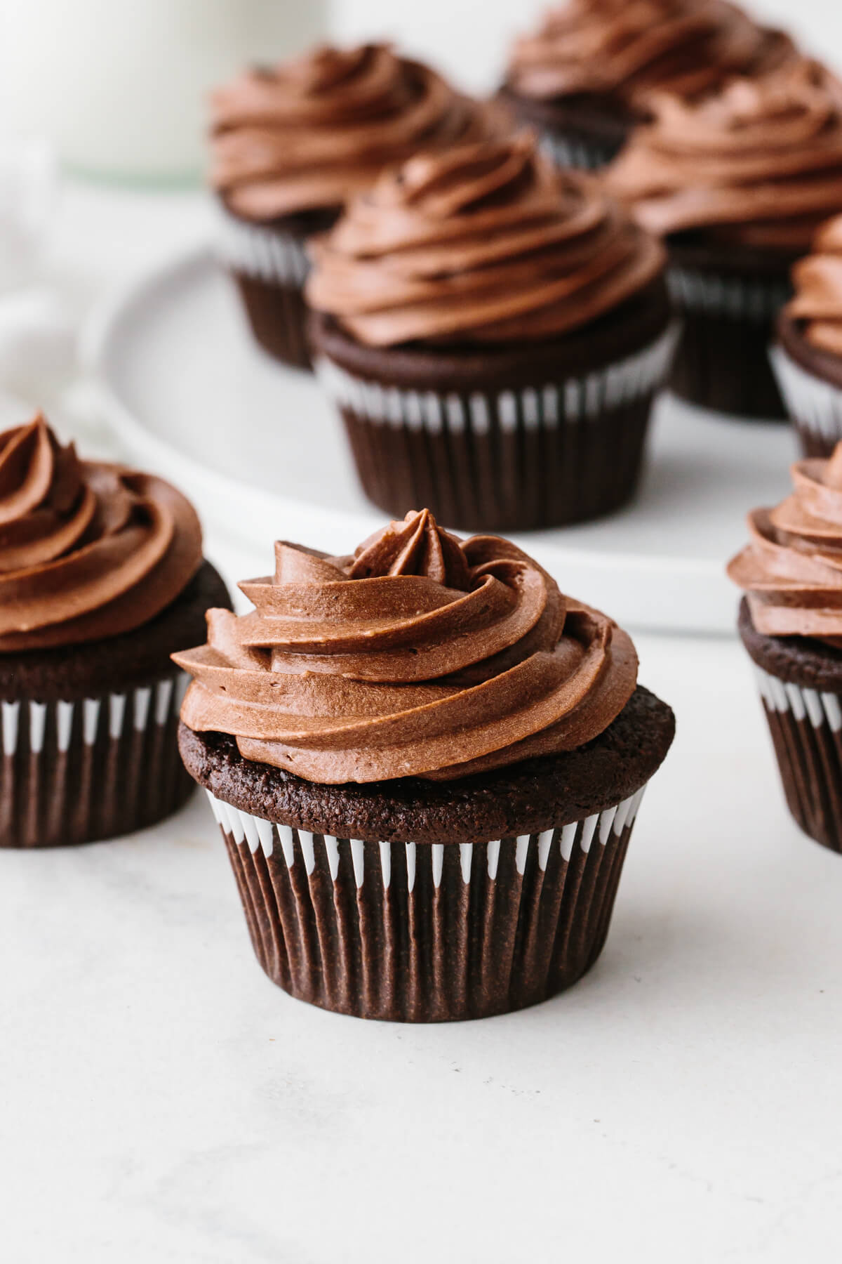 Paleo chocolate cupcakes on a table.