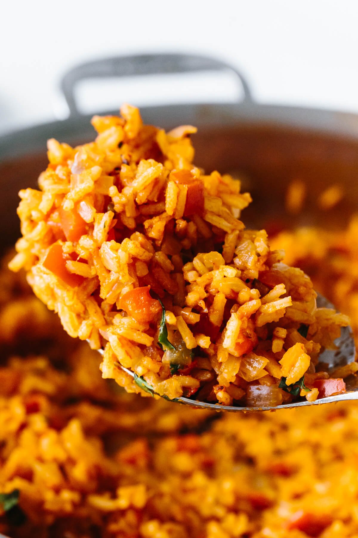 A large spoonful of Mexican rice.