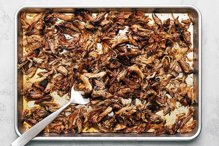 A sheet pan of crispy carnitas.