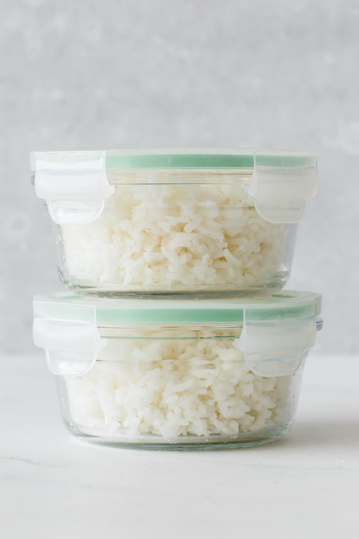 Rice that is stored and meal prepped in containers.
