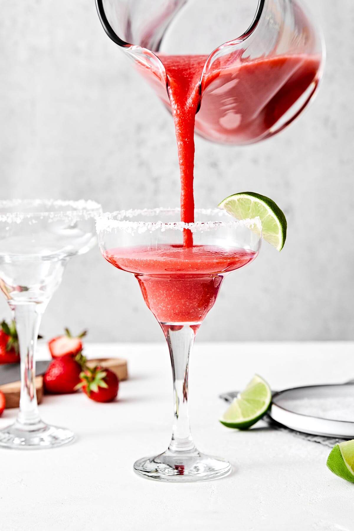 Prepping strawberry margaritas.