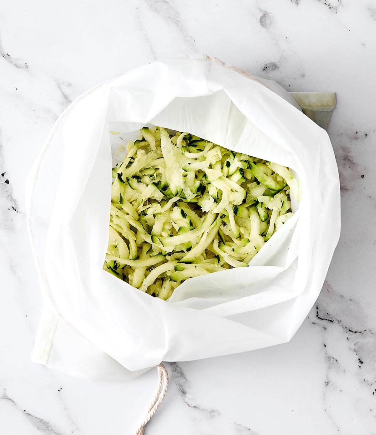 This gluten-free zucchini bread is the kind of loaf you’ll want to keep on your counter all summer long. It’s perfectly moist, gently spiced, and sneaks in a little veggie boost to your morning breakfast. Grated zucchini in a bag for bread.