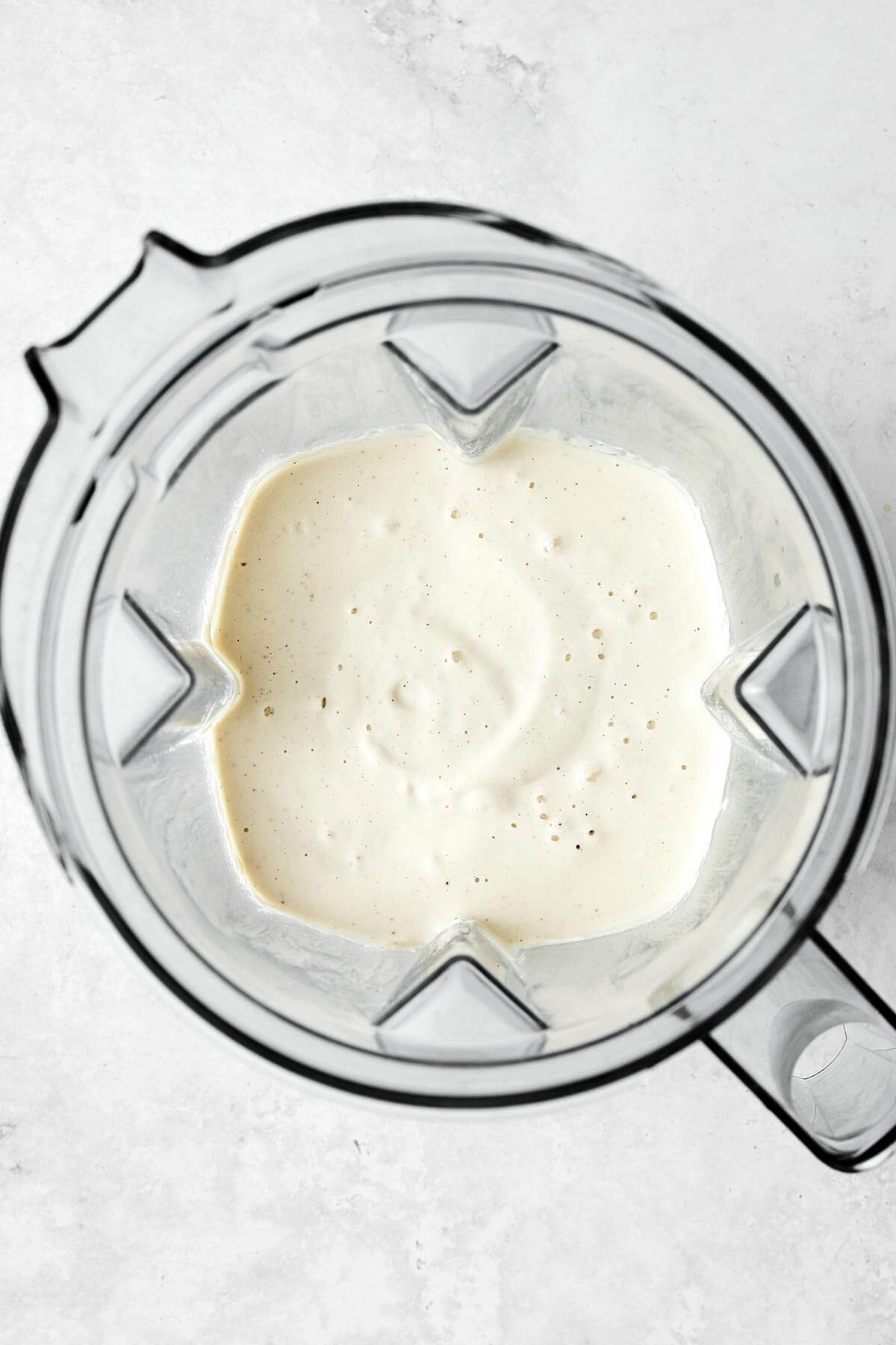 Blended vegan alfredo sauce.