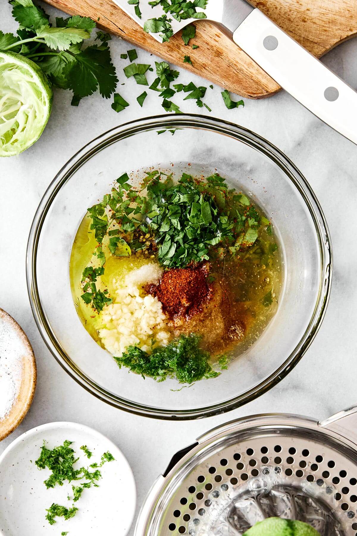 This cilantro lime chicken is incredibly juicy, bursting with bright flavors, and an easy weeknight dinner everyone will love. Cilantro lime marinade in a bowl for chicken.