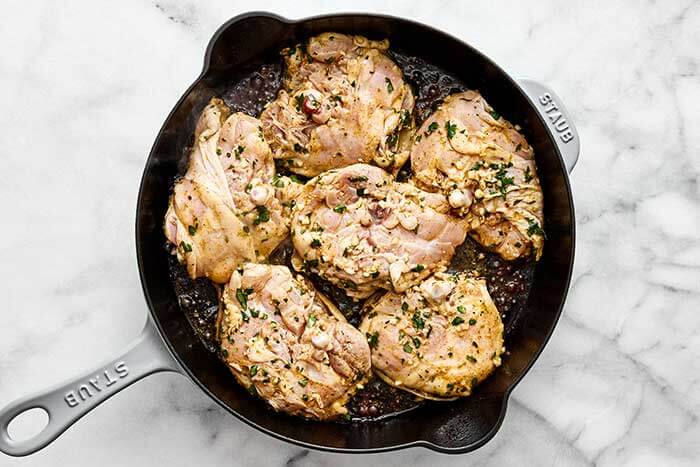 Cilantro lime chicken seared in a skillet.