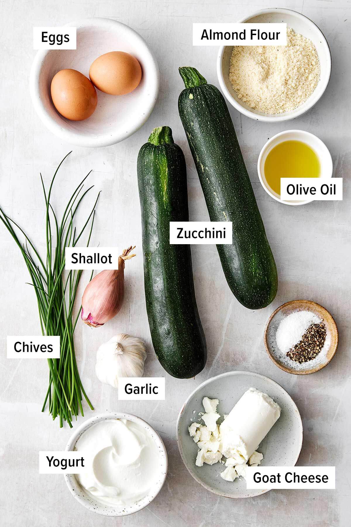 Zucchini fritters are everyone’s favorite summer dinner. With savory flavors, crispy edges, and a dollop of creamy garlic chive yogurt sauce, it's the perfect zucchini recipe to keep in rotation! Zucchini fritters ingredients.