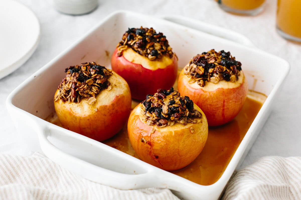 Baked apples in a baking dish fresh out of the oven.