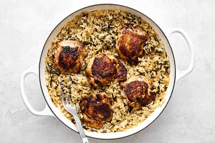 Chicken and rice in a pan.