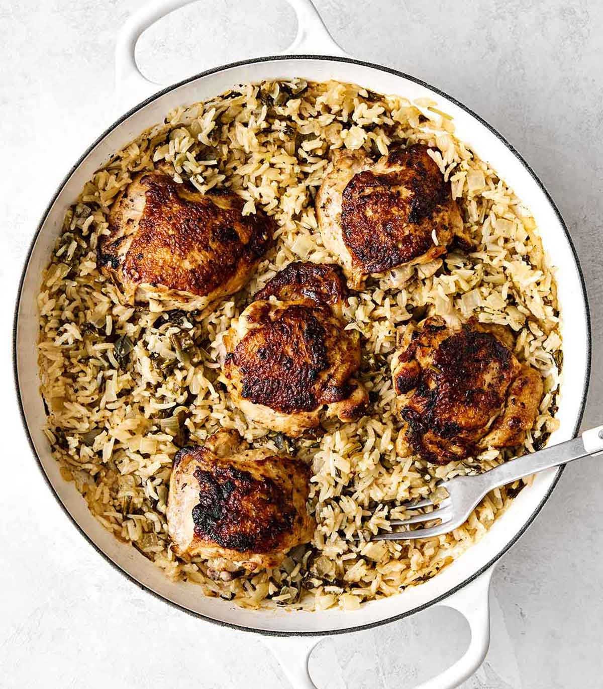 A pan of chicken and rice.