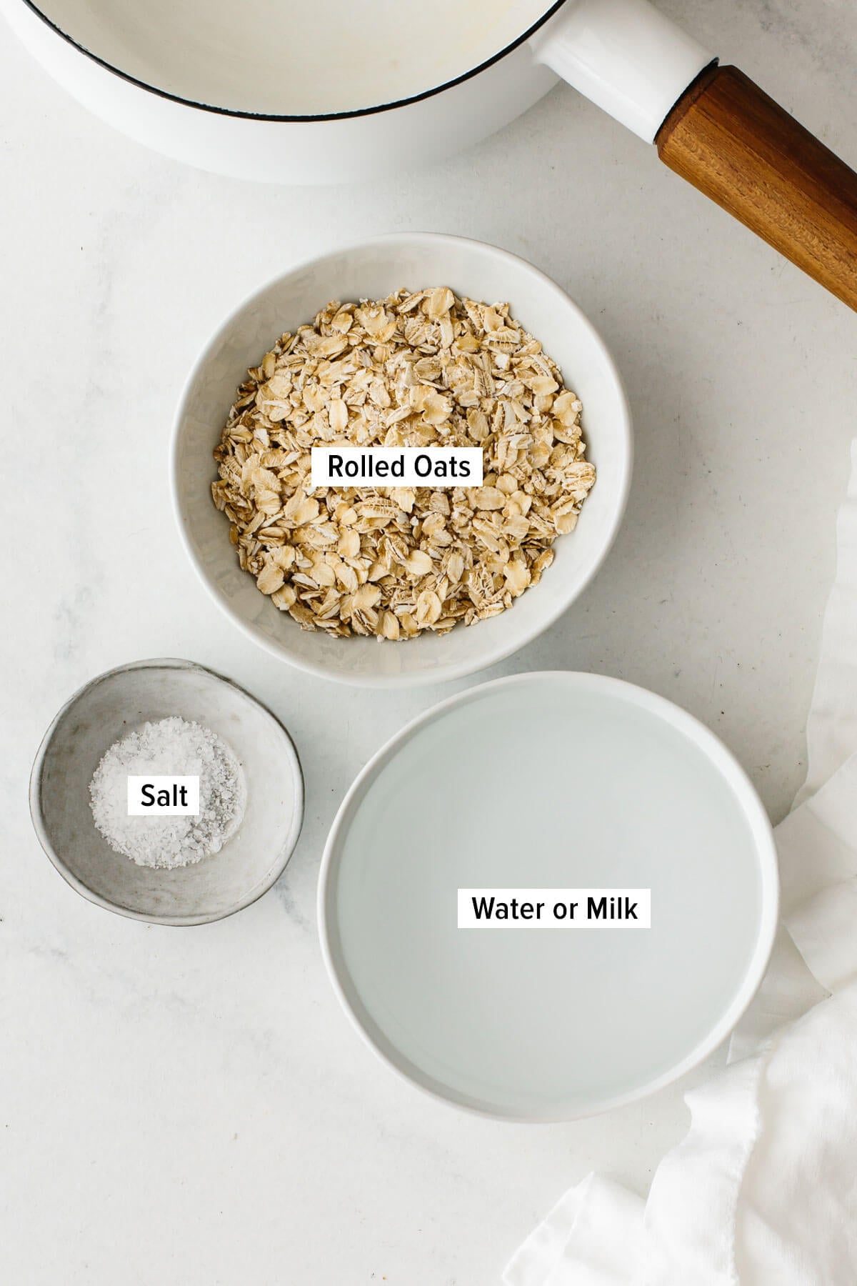 Ingredients for oatmeal laying on a table